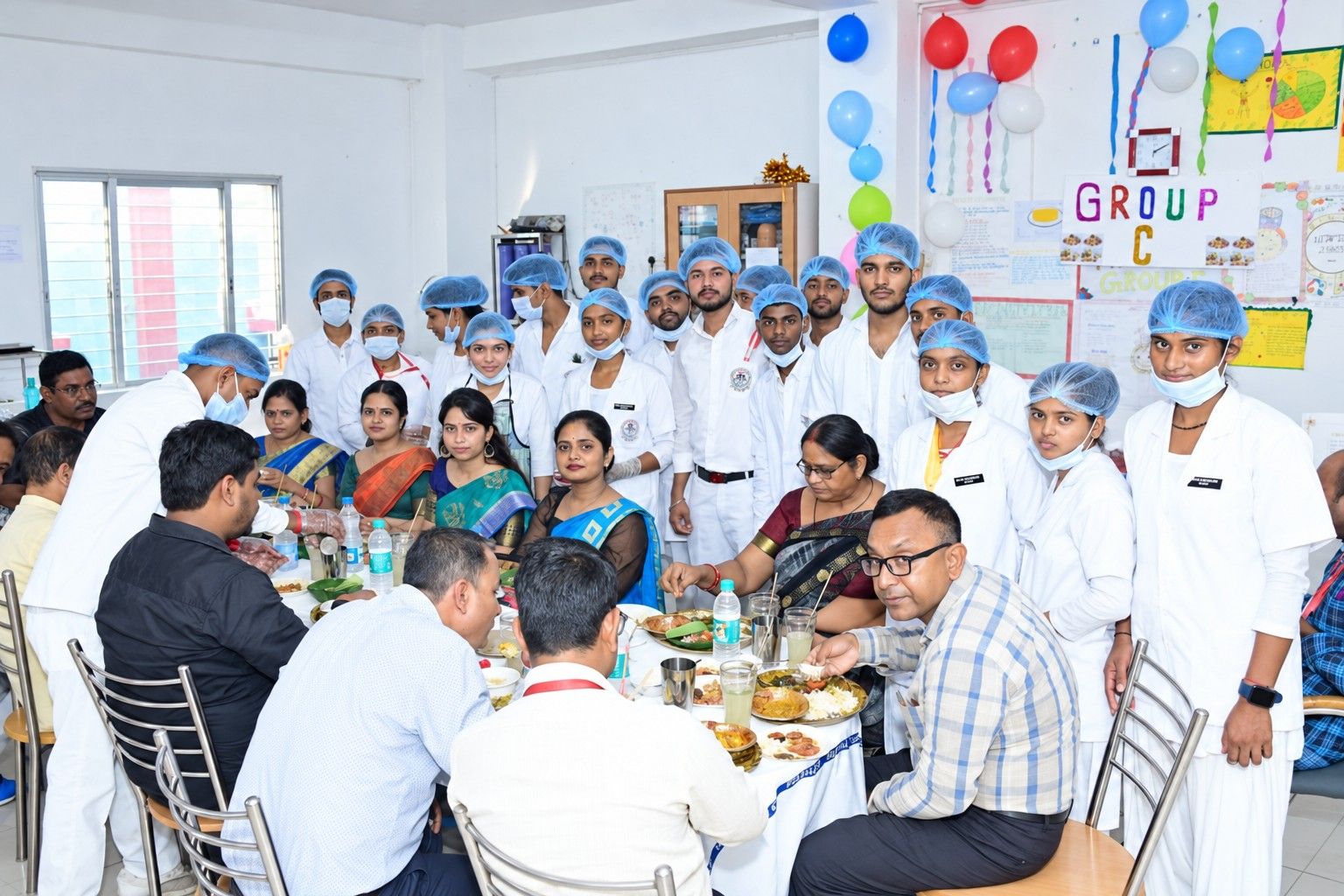 Students and faculty at a celebration lunch